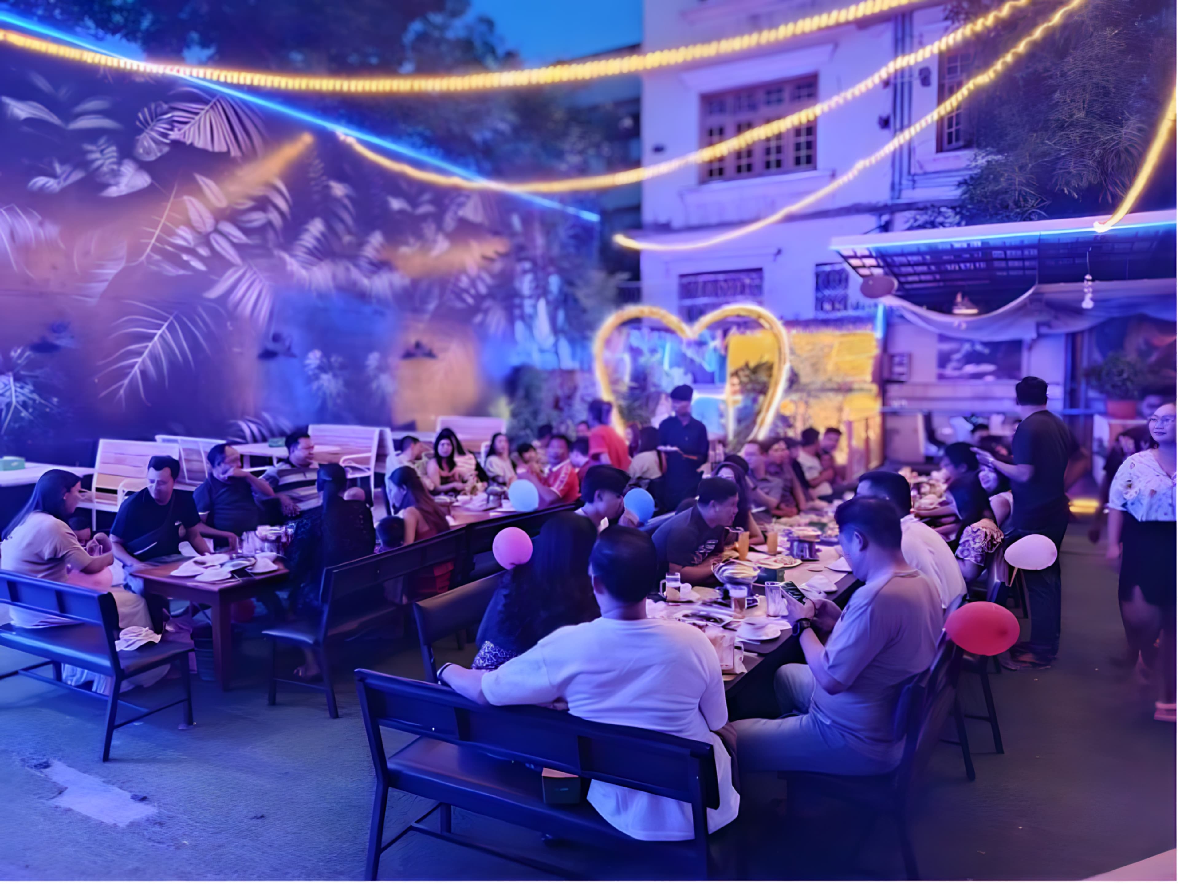 Guests gathered indoors at UN Bar & Garden